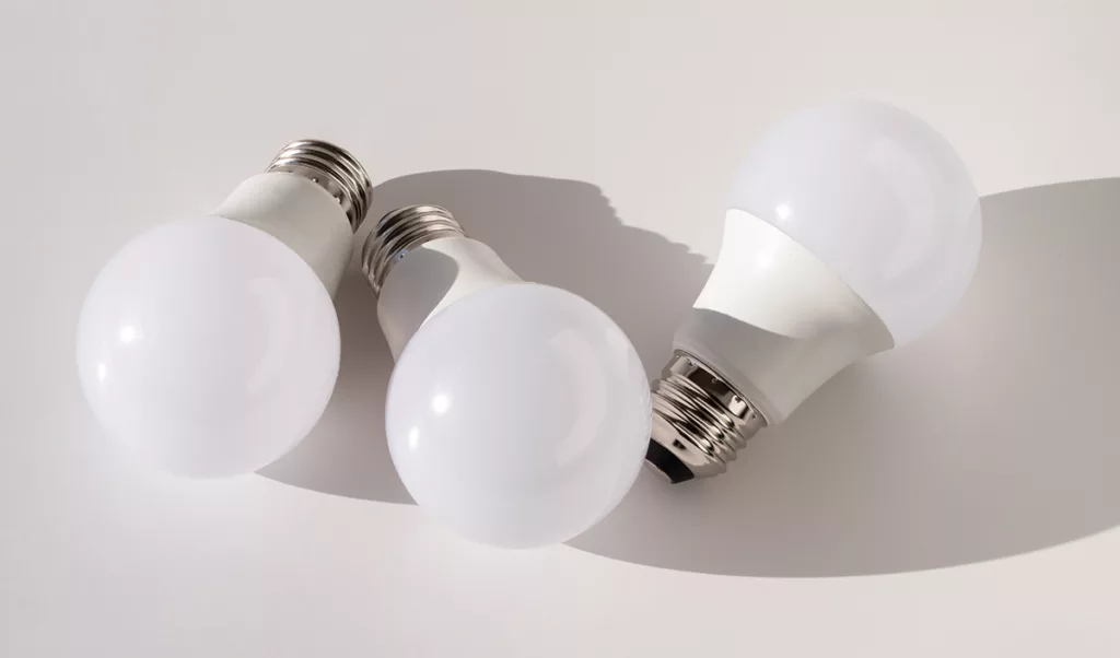 Three LED light bulbs against a white background.